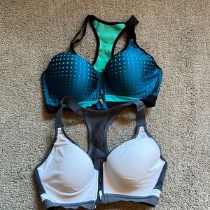 Blue/teal and white pair of VSX Victoria’s Secret sports bras.